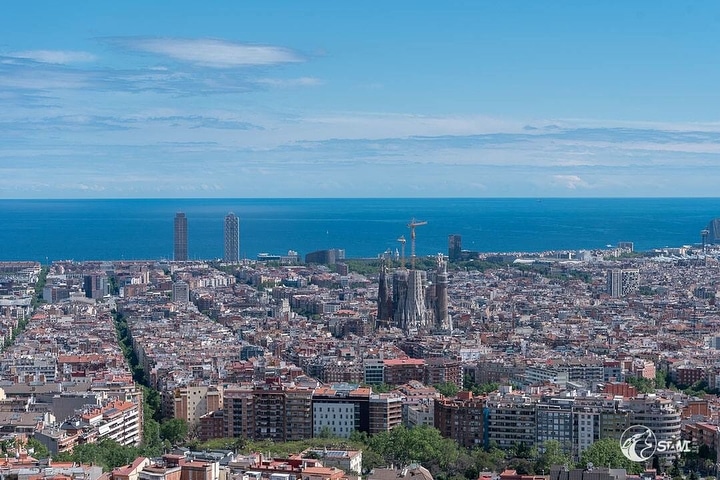 View over Barcelona with Sky, Sea and Sagrada Família